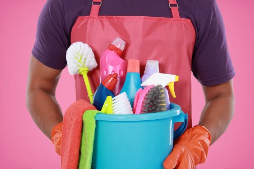 Commercial cleaning team working in a KT6 office environment