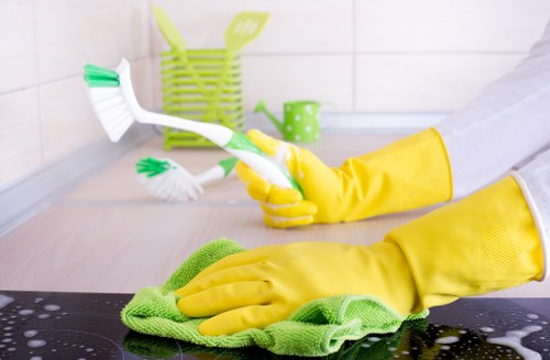 Local communal area cleaning team working in a KT6 apartment block