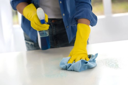 Cleaning team working in a KT6 flat with local access considerations